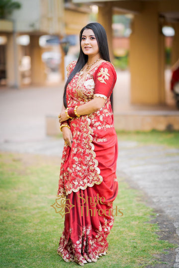 Exquisite embroidered festive red soft Silk saree